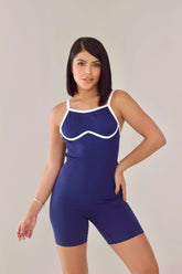 Enterizo corto seamless azul en tejido SKINFLEX, ajustado y moldeador para entrenamiento y uso casual.